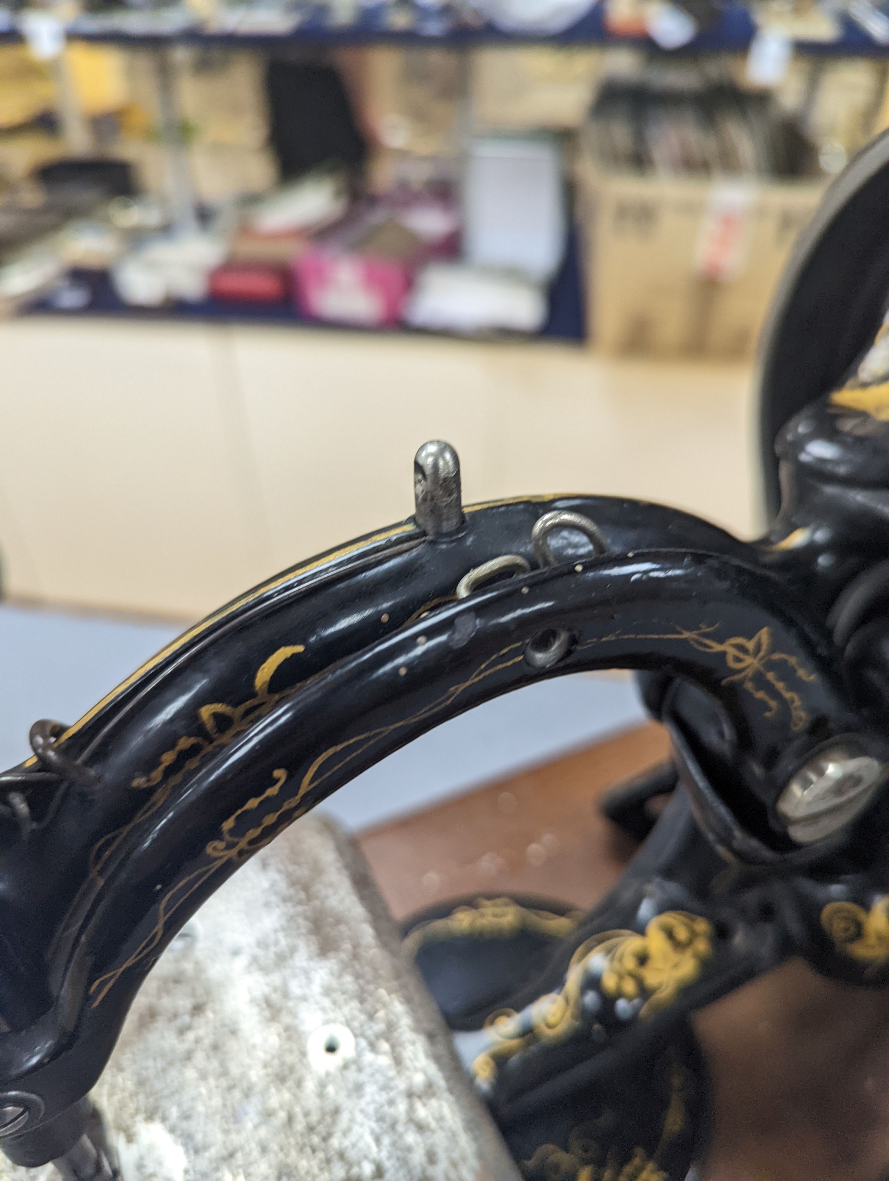 A Victorian sewing machine, Corona typewriter and two microscopes